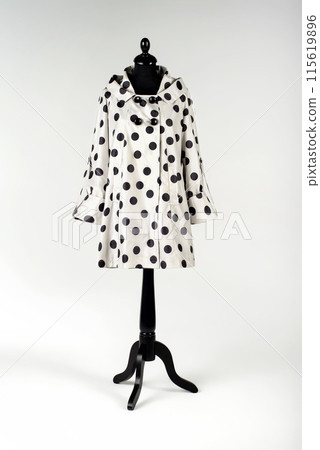 Women's and men's clothing on a mannequin Women's and men's clothing on a mannequin 115619896
