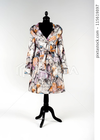 Women's and men's clothing on a mannequin 115619897