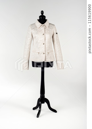 Women's and men's clothing on a mannequin Women's and men's clothing on a mannequin 115619900
