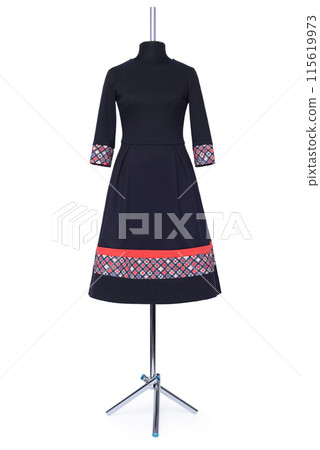 Women's and men's clothing on a mannequin 115619973