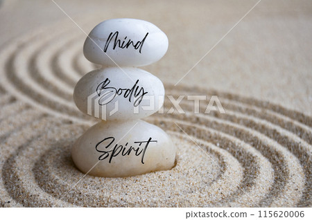 Mind, body and soul text on zen stones with sand background. Meditation concept. Mind, body and soul text on zen stones with sand background. Meditation concept. 115620006