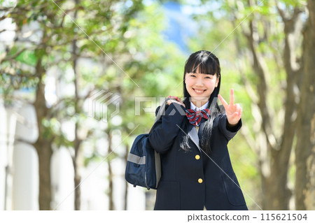 High school girl, commuting, fresh greenery, peace sign 115621504