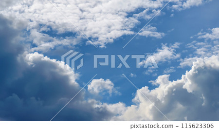 Fluffy soft clouds. Beautiful cloudy sky. Dream cloud of heaven. Nature background or backdrop. Fluffy soft clouds. Beautiful cloudy sky. Dream cloud of heaven. Nature background or backdrop. 115623306