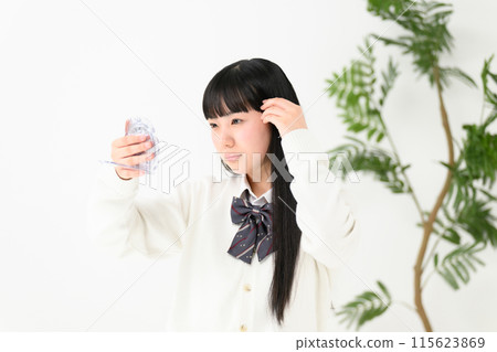 High school girl worried about her bangs High school girl worried about her bangs 115623869