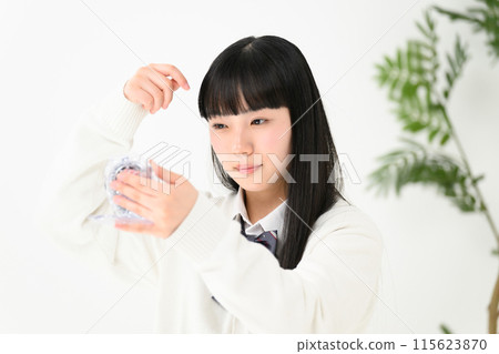 High school girl worried about her bangs 115623870