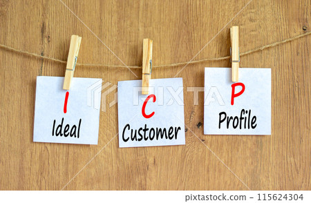 ICP ideal customer profile symbol. Concept words ICP ideal customer profile on beautiful white paper. Beautiful wooden background. Business ICP ideal customer profile concept. Copy space. 115624304