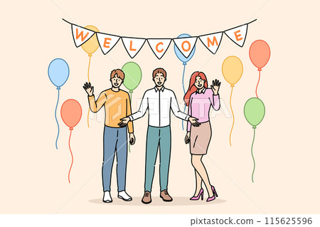Welcome party from happy family welcoming friends into new apartment with balloons to celebrate move 115625596