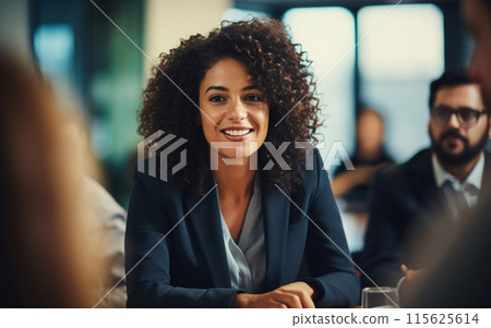 Confident Businesswoman Leading a Meeting Confident Businesswoman Leading a Meeting 115625614