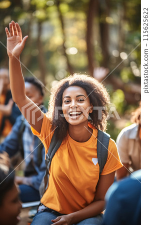 Happy Volunteer in Orange T-shirt 115625622