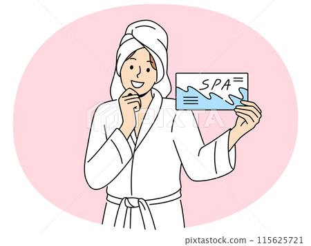 Smiling woman with spa voucher in hands Smiling woman with spa voucher in hands 115625721