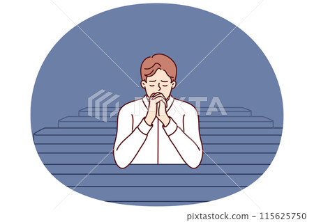 Christian man sits and prays in catholic church, turning to god to confess or ask for help Christian man sits and prays in catholic church, turning to god to confess or ask for help 115625750