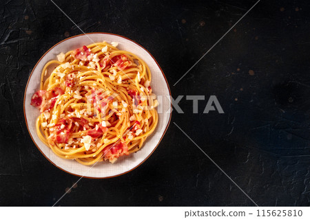 Carbonara pasta dish, traditional spaghetti with pancetta and cheese Carbonara pasta dish, traditional spaghetti with pancetta and cheese 115625810
