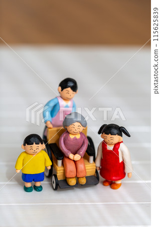 Handmade paper clay doll family 115625839