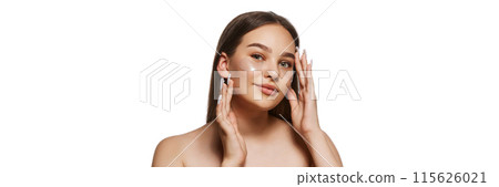 Portrait of attractive young girl with no makeup look, taking care after perfect skin with under eye patches isolated on white background Portrait of attractive young girl with no makeup look, taking care after perfect skin with under eye patches isolated on white background 115626021