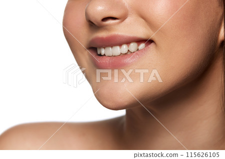 Cropped image of female face, girl smiling isolated on white background. Ten whitening, dental care, health check up Cropped image of female face, girl smiling isolated on white background. Ten whitening, dental care, health check up 115626105