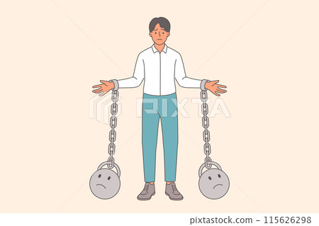 Business man slave suffers from lack of freedom, stands with weights tied in hands 115626298