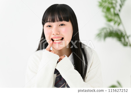 High school girl dental care teeth 115627252