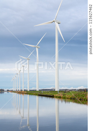 Windmill at the river 115627462
