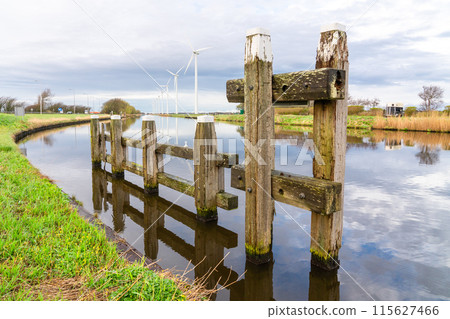 Windmill at the river 115627466