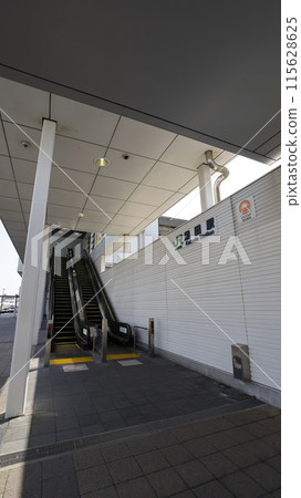 Escalator at the entrance/exit of Katsuta Station on the JR Joban Line 115628625