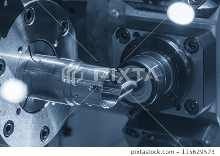 The CNC lathe machine milling the metal tube parts by milling spindle. The CNC lathe machine milling the metal tube parts by milling spindle. 115629573