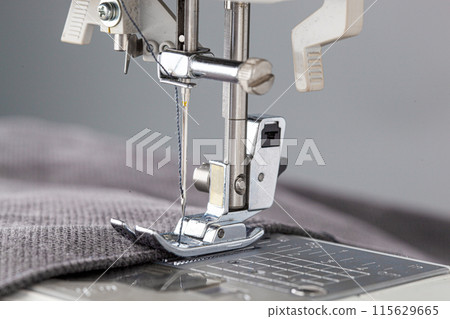 Sewing machine, stitching fabrics, needle in a round plan 115629665