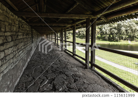 Covered gallery on top of a stone fortress wall, perspective view 115631999