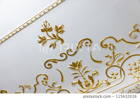 White ceiling decoration with golden bas relief gypsum details 115632016