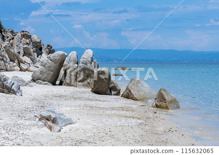 Big rock on the beach shore Big rock on the beach shore 115632065