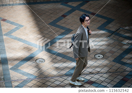 Casual businessman commuting to work Casual businessman commuting to work 115632542