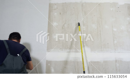 Time lapse of wallpapering in the room. 115633054