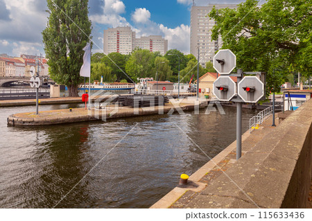Embankment of the Spree River in the historical part of Berlin on a sunny day. Germany. Embankment of the Spree River in the historical part of Berlin on a sunny day. Germany. 115633436