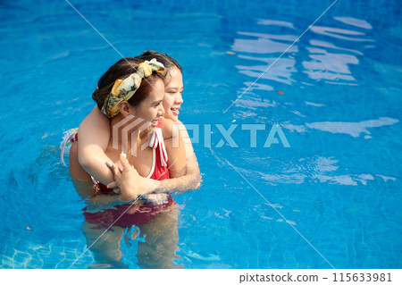 Daughter and Mother Swimming in Deep Pool Daughter and Mother Swimming in Deep Pool 115633981