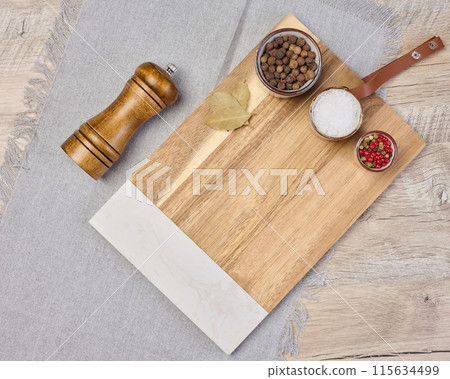 Empty rectangular wooden cutting board on table, top view 115634499
