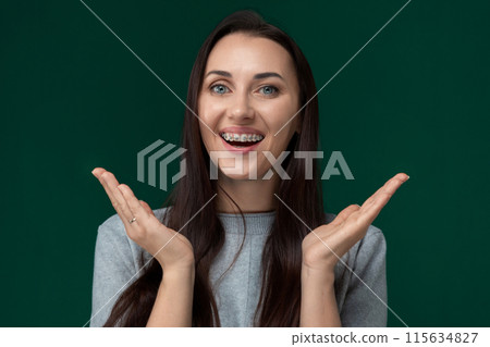 Woman Making Funny Face With Hands 115634827