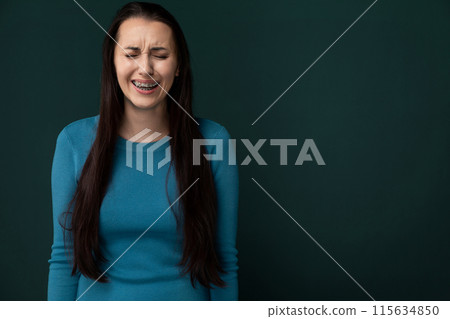 Woman Smiling With Eyes Closed 115634850