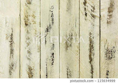 The wooden surface of the boards a bright color with black fading 115634999