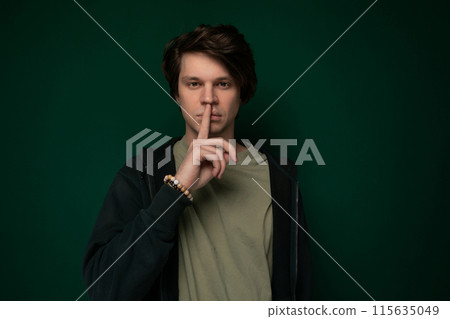 Man Making a Hush Gesture Man Making a Hush Gesture 115635049