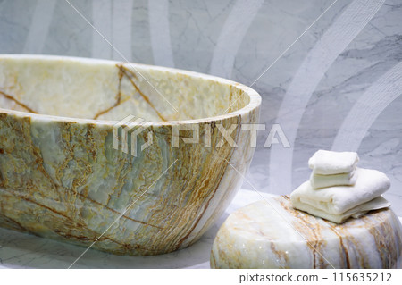freestanding tub in natural stone finish bathroom 115635212