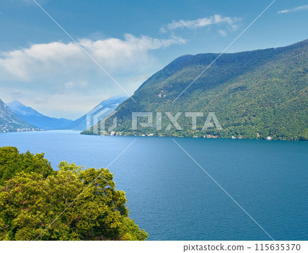Lake Lugano summer misty view (between Switzerland and Italy). 115635370