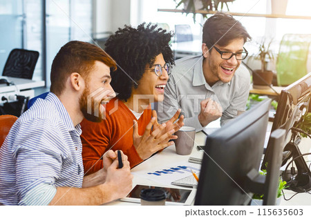 Successful work. Three young men enjoying good coding job on computer monitor at modern office, panorama 115635603