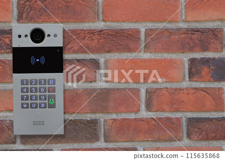 Doorbell Intercom on Brick Wall Doorbell Intercom on Brick Wall 115635868