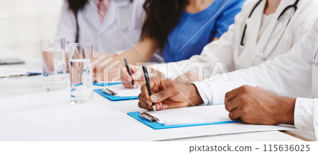 Medical Education. Doctors Writing Notes At Conference In Hospital 115636025
