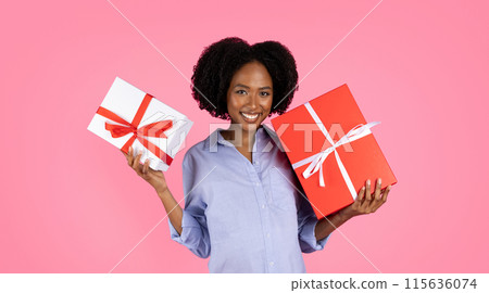 Happy millennial black lady shows boxes with presents, enjoy celebrate party of unborn child, isolated on pink background, studio, panorama. Gift idea, congratulations on birthday Happy millennial black lady shows boxes with presents, enjoy celebrate party of unborn child, isolated on pink background, studio, panorama. Gift idea, congratulations on birthday 115636074
