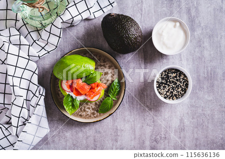 Keto burger made from avocado, yogurt, red fish and radish on a plate on the table top view Keto burger made from avocado, yogurt, red fish and radish on a plate on the table top view 115636136