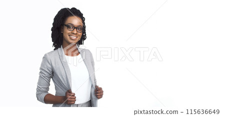Self-assured African American businesswoman in a grey suit jacket and spectacles, standing against a white backdrop, with panoramic space for text. Self-assured African American businesswoman in a grey suit jacket and spectacles, standing against a white backdrop, with panoramic space for text. 115636649