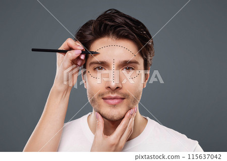 Plastic surgery concept. Surgeon drawing marks on male face on gray background, panorama 115637042