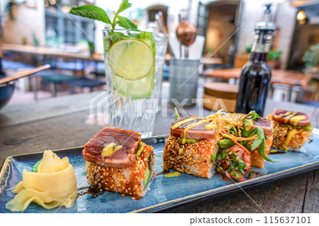 Overhead view of platter of sushi rolls Overhead view of platter of sushi rolls 115637101