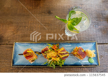 Overhead view of platter of sushi rolls Overhead view of platter of sushi rolls 115637545