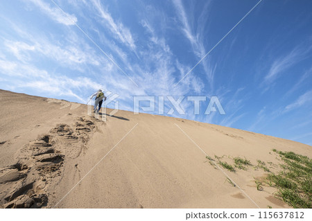 Image of trekking in Tottori Sand Dunes Image of trekking in Tottori Sand Dunes 115637812